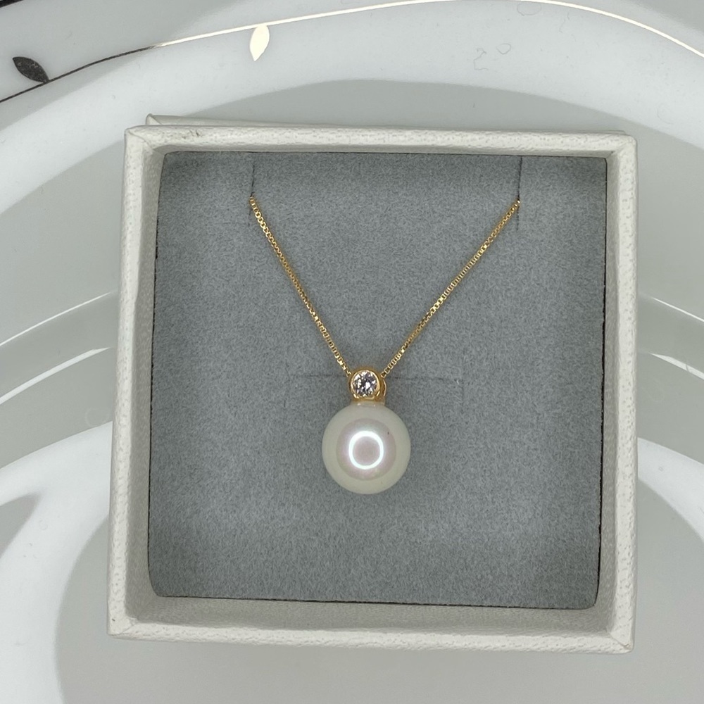 Simulated 10mm pearl pendant with CZ